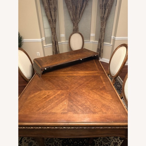 Used Solid Wood Dining Set for sale on AptDeco