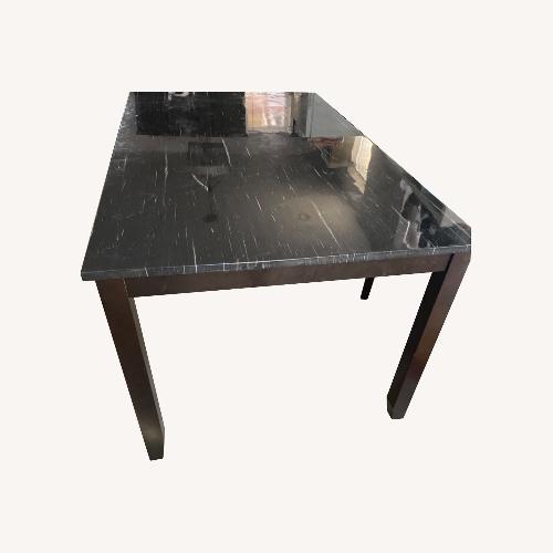 Used Modern Dining Table for sale on AptDeco