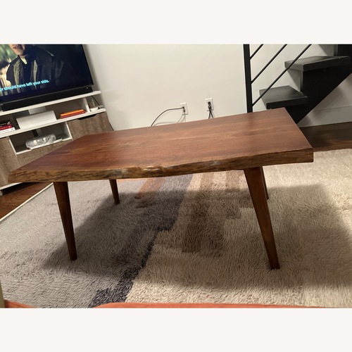 Used Dark Brown Wood Coffee Table for sale on AptDeco