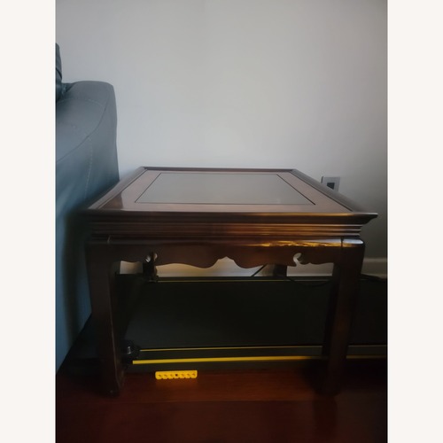 Used Dark Brown Wood Coffee Table for sale on AptDeco