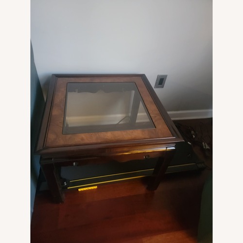 Used Dark Brown Wood Coffee Table for sale on AptDeco
