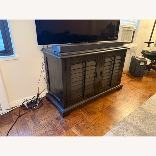 Used Dark Brown Wood Media Storage for sale on AptDeco