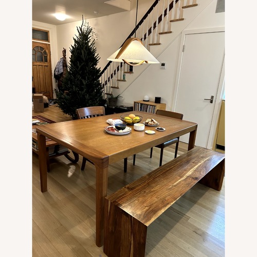 Used Mid-Century Solid Teak Dining Table for sale on AptDeco