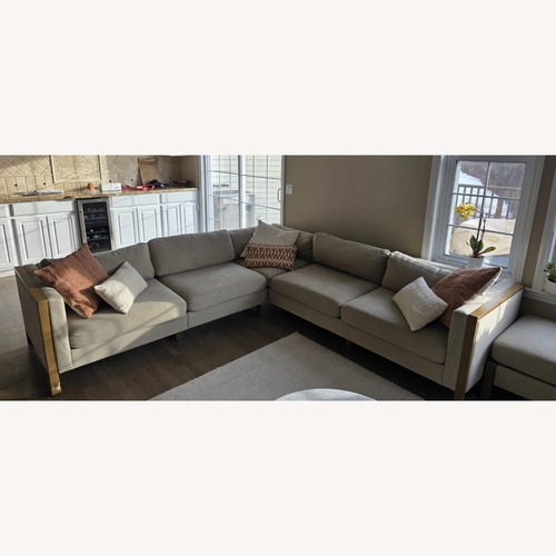 Used Elegant Sectional with Storage Ottoman 103×103 for sale on AptDeco