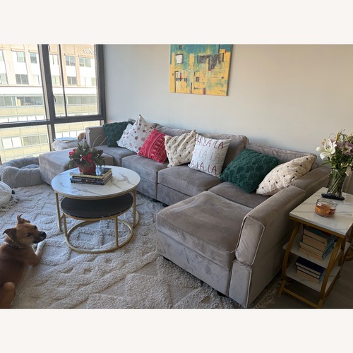 Used Nairoby 6 Storage Ottomans Sleeper Sectional for sale on AptDeco