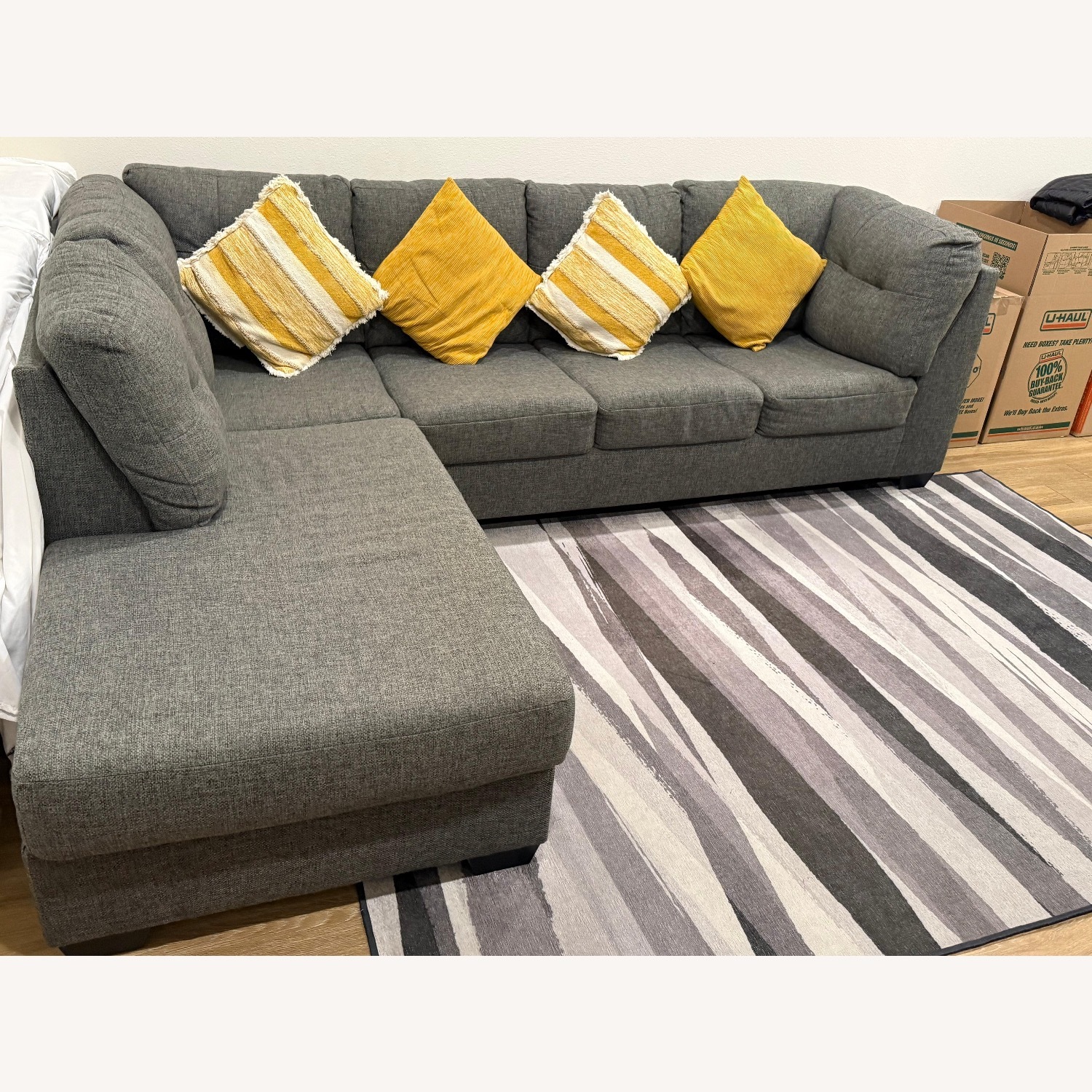 Living Spaces Dark Gray Fabric 3+ Piece Sectional - image-6