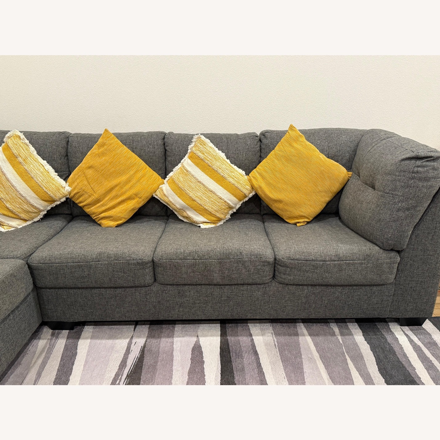 Living Spaces Dark Gray Fabric 3+ Piece Sectional - image-5