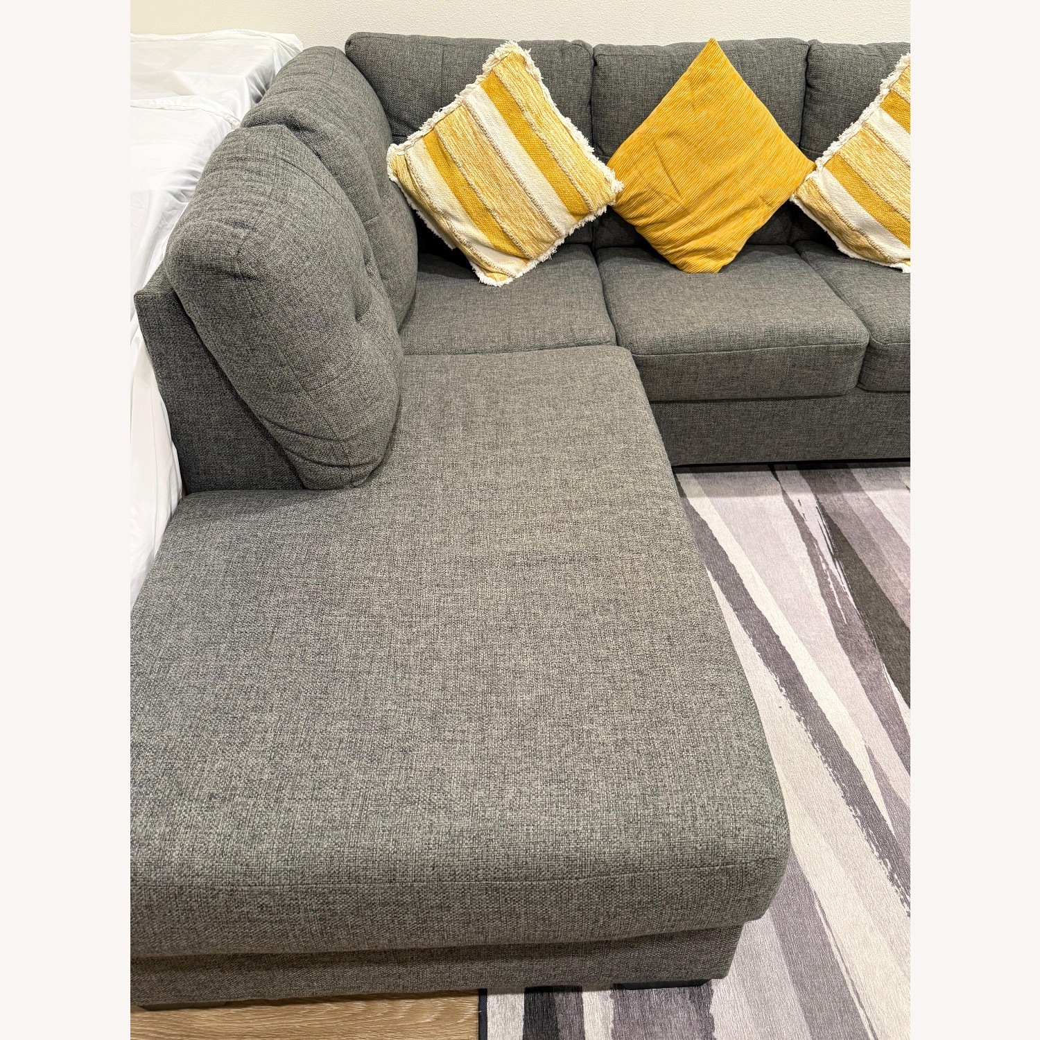 Living Spaces Dark Gray Fabric 3+ Piece Sectional - image-3