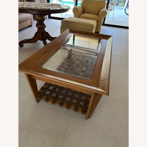 Used Rooms To Go  Light Brown Wood Coffee Table for sale on AptDeco