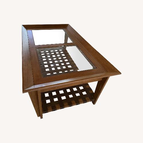 Used Rooms To Go  Light Brown Wood Coffee Table for sale on AptDeco