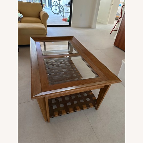 Used Rooms To Go  Light Brown Wood Coffee Table for sale on AptDeco