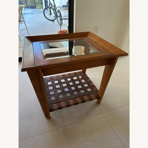 Used Rooms To Go  Natural Wood Side Table for sale on AptDeco