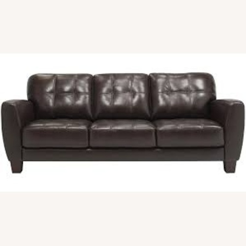 Used Raymour & Flanigan Brown Leather Sofa  for sale on AptDeco