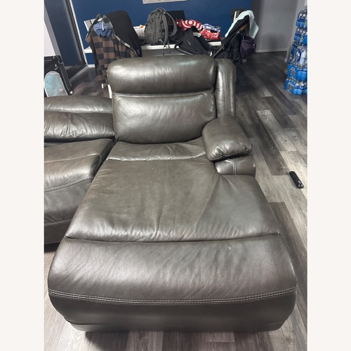 Used Bob's Discount Dark Grey Leather Reclining Chaise for sale on AptDeco