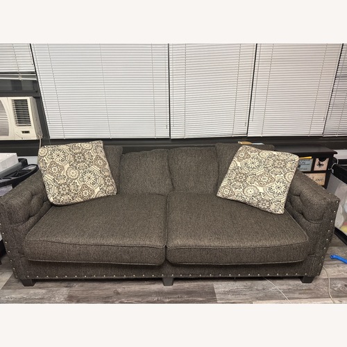 Used Bob's Discount Furniture Dark Gray 2 Seater Sofa for sale on AptDeco