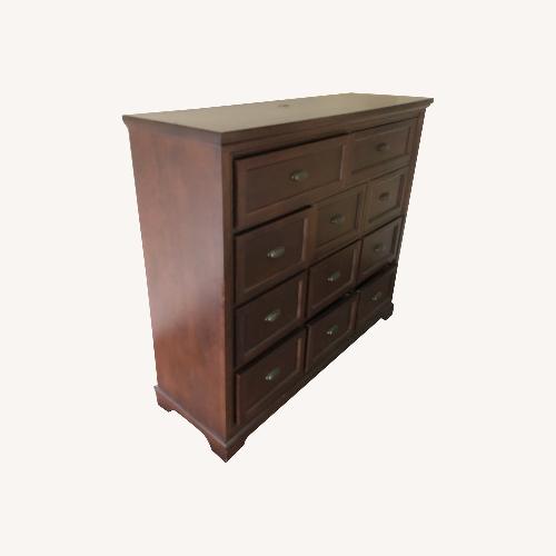Used Bayside Furnishings Dark Brown Wood Dresser for sale on AptDeco