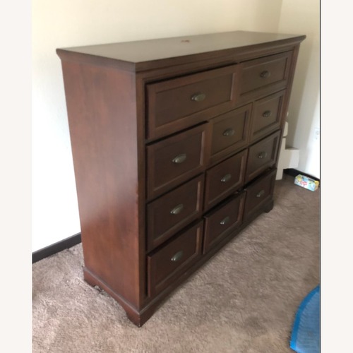 Used Bayside Furnishings Dark Brown Wood Dresser for sale on AptDeco