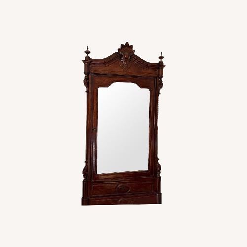 Used Dark Brown Mahogany Wood Armoire for sale on AptDeco