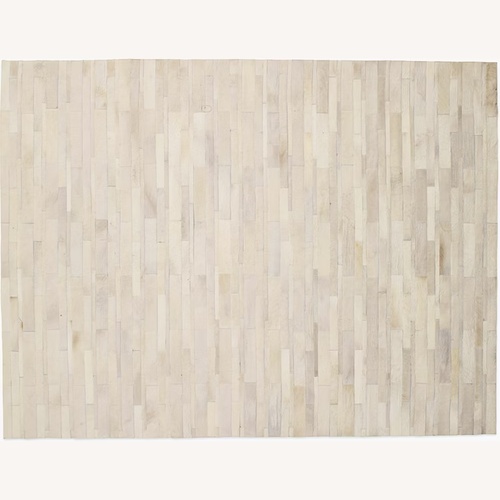 Used Design Within Reach Cowhide Area Rug 8' x 10' for sale on AptDeco