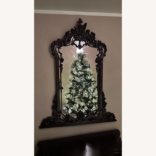 Used Vintage/Antique Finds Dark Brown Wood Wall Mirror for sale on AptDeco