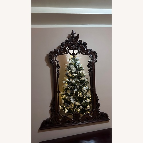 Used Vintage/Antique Finds Dark Brown Wood Wall Mirror for sale on AptDeco