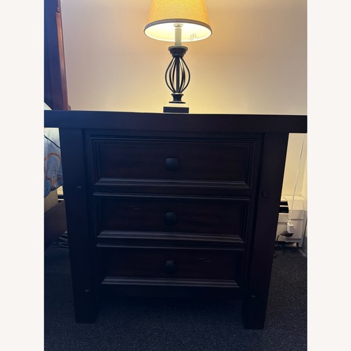 Used Dark Brown Wood Nightstand for sale on AptDeco