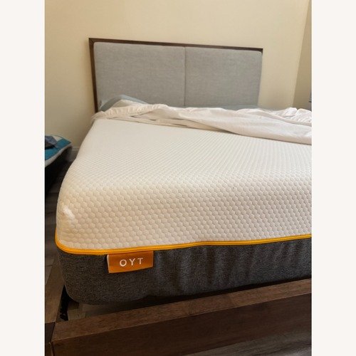 Used Dark Brown Wood Bed Frame for sale on AptDeco