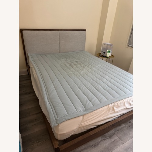 Used Dark Brown Wood Bed Frame for sale on AptDeco