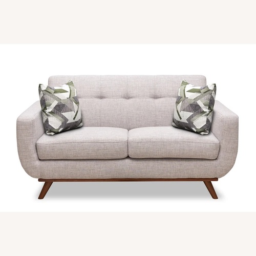 Used Tufted Round Rust/Terracotta Ottoman for sale on AptDeco