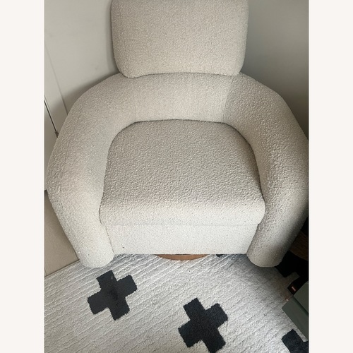 Used Crate & Barrel Kids Cream Boucle Swivel Glider for sale on AptDeco