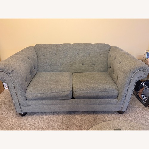 Used Dark Gray Tufted Loveseat for sale on AptDeco