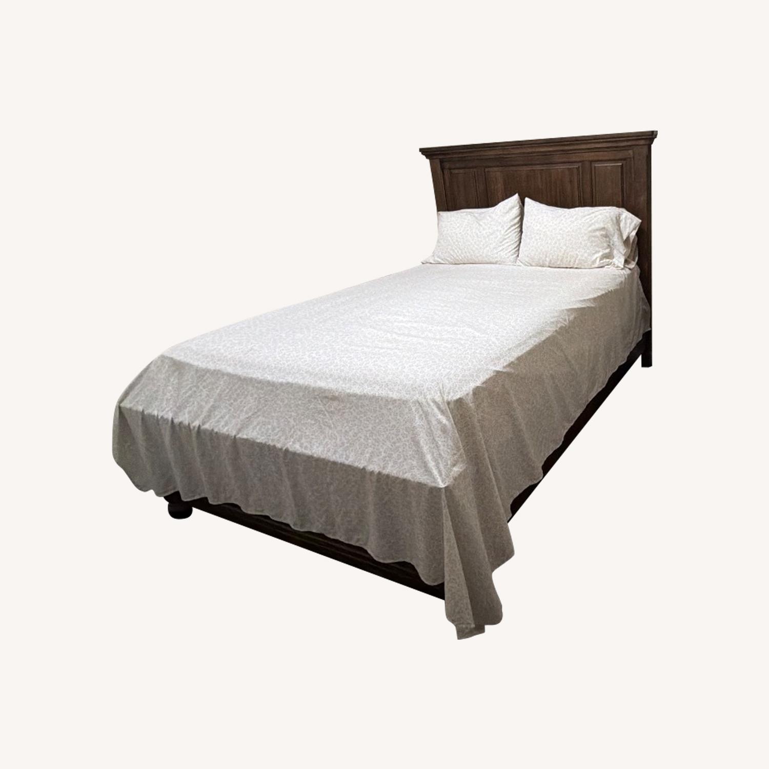 Ashley Furniture Light Brown Wood Queen Bed - image-0