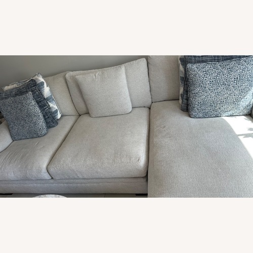 Used Rooms To Go White 2 Piece Sectional for sale on AptDeco