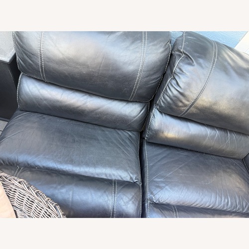 Used Black Fabric 2 Piece Sectional for sale on AptDeco
