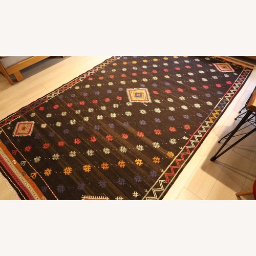Used Mocha Mousse Mid-Century Area Rug for sale on AptDeco