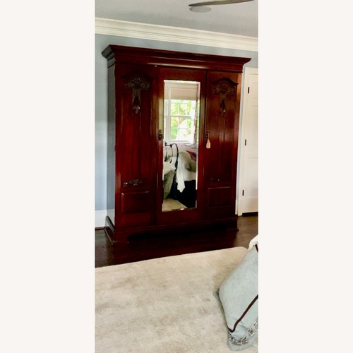 Used Antique Mirrored Armoire for sale on AptDeco