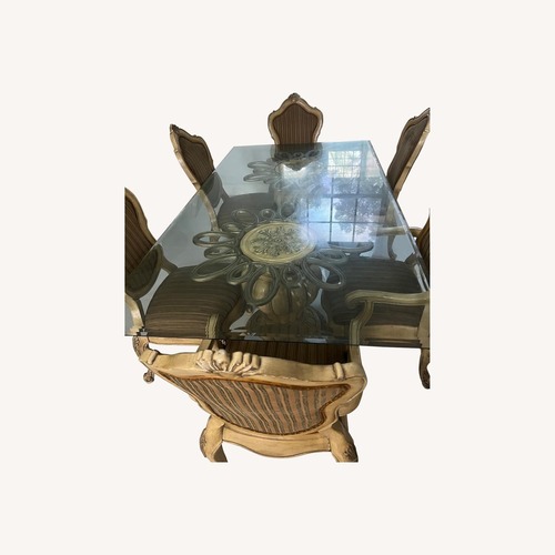 Used Glass Dining Table and 6 Chairs for sale on AptDeco