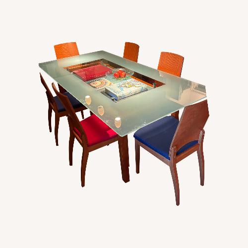 Used Contemporary Glass Dining Table and Chairs for sale on AptDeco