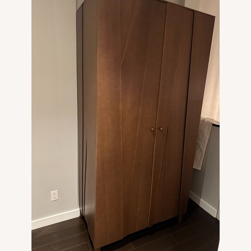 Used Roche Bobois Dark Brown Wood Armoire for sale on AptDeco