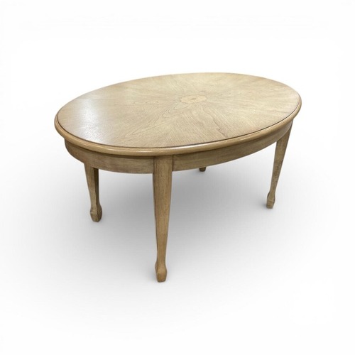 Used Clayton Oval Coffee Table Light Ash for sale on AptDeco