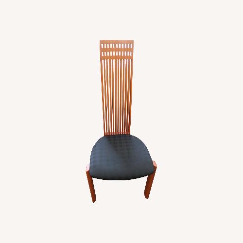 Used Costantini Pietro Black Dining Chairs for sale on AptDeco