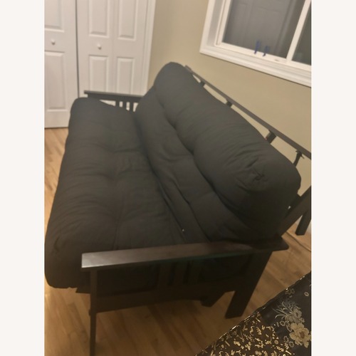 Used Futon World Dark Brown Wood Futon for sale on AptDeco