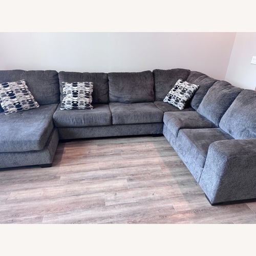 Used Ashley Furniture Light Gray 3+ Piece Sectional for sale on AptDeco