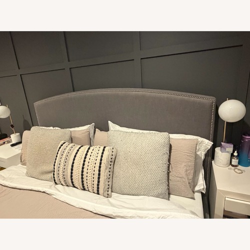 Used Pottery Barn Dark Gray Fabric King Bed for sale on AptDeco