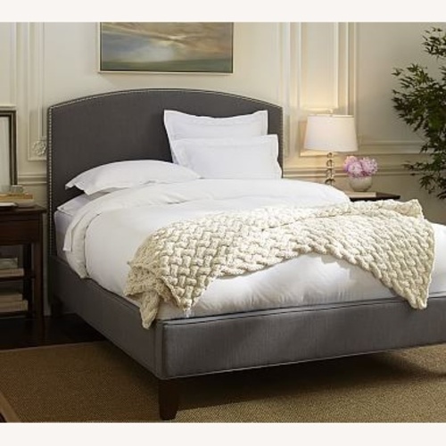Used Pottery Barn Dark Gray Fabric King Bed for sale on AptDeco
