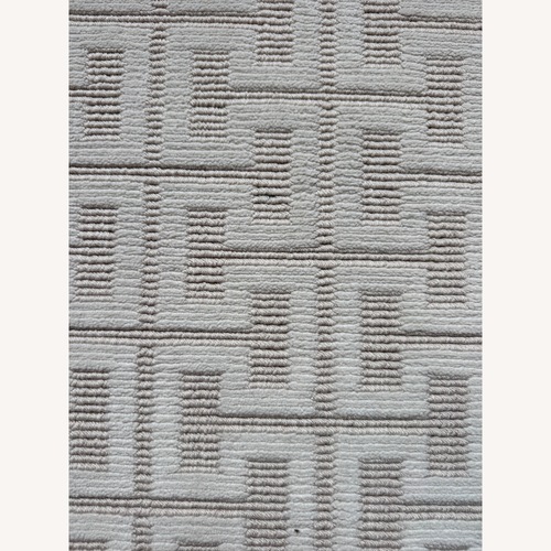 Used White Fabric Area Rug 10' x 16' for sale on AptDeco