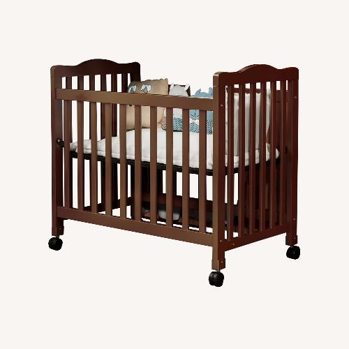 Used Fizzy Baby Dark Brown Crib for sale on AptDeco