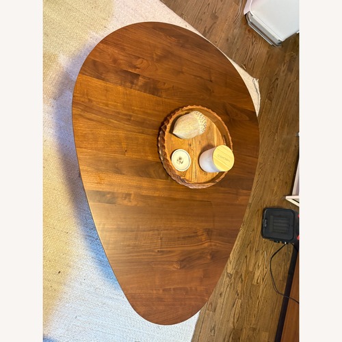 Used Article Amoeba Dark Brown Wood Coffee Table for sale on AptDeco