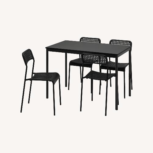 Used IKEA Sandsberg Dark Brown Wood Dining Table for sale on AptDeco