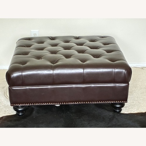 Used Dark Brown Leather Ottoman  for sale on AptDeco